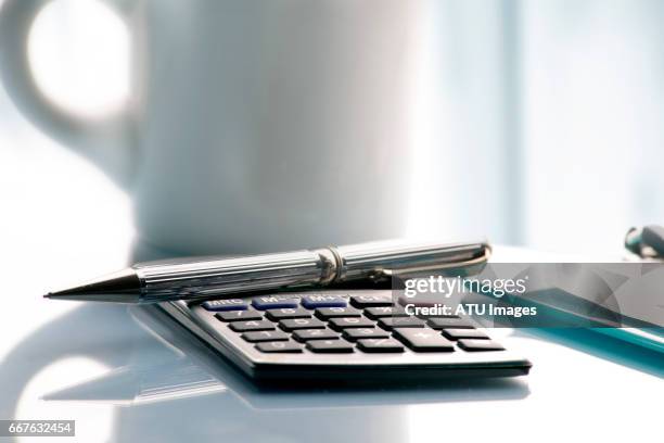 calculator coffee pen - calculating machine stock pictures, royalty-free photos & images