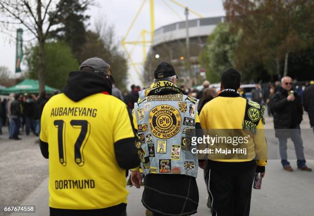 Dortmund fans walk towards the stadium prior to the UEFA Champions League Quarter Final first leg match between Borussia Dortmund and AS Monaco at...