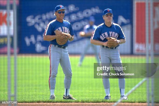New York Mets pitching coach Mel Stottlemyre with manager Jeff Torborg during spring training before game vs Montreal Expos at Thomas J. White...