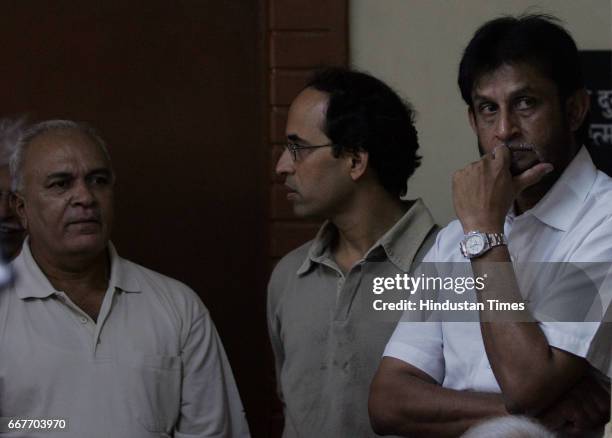 Ex-India cricketer Kenia Jayantilal, television presenter Harsha Bhogle and former international Sandeep Patil at Dilip Sardesai's cremation at the...