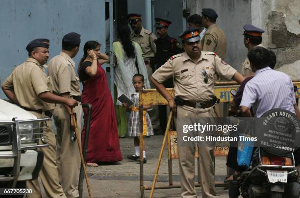 Education - Shiv Sena activists came to Queen Mary School in Opera House to protest against the incident where a teacher put scotch tape on children...