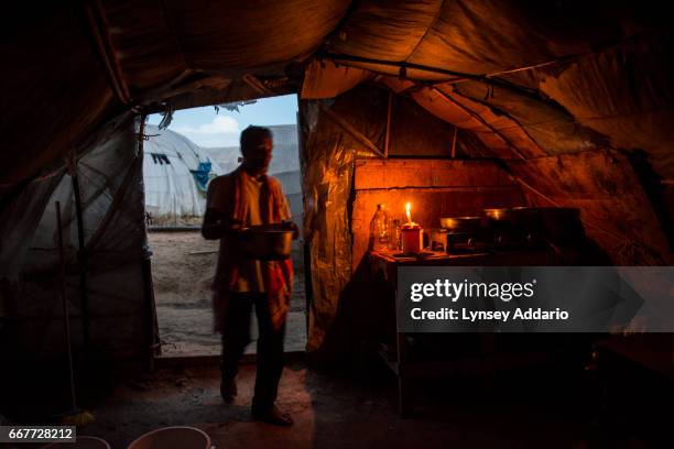 Group of Bangladeshis live in tents on strawberry fields where they worked on the farms until they were shot by their employer for demanding back pay...