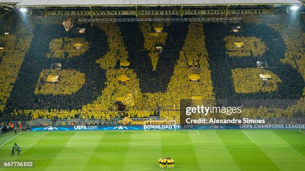 The fans of Borussia Dortmund in action prior to the UEFA Champions League Quarter Final: First Leg match between Borussia Dortmund and AS Monaco at...