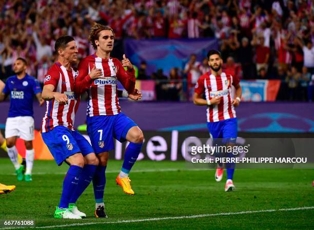 Atletico Madrid's French forward Antoine Griezmann celebrates a penalty goal during the UEFA Champions League quarter final first leg football match...