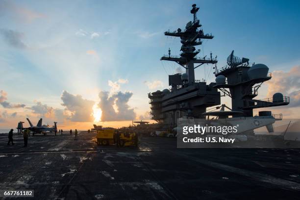 In this handout photo provided by the U.S. Navy, the aircraft carrier USS Carl Vinson transits the South China Sea on April 8, 2017. The Carl Vinson...