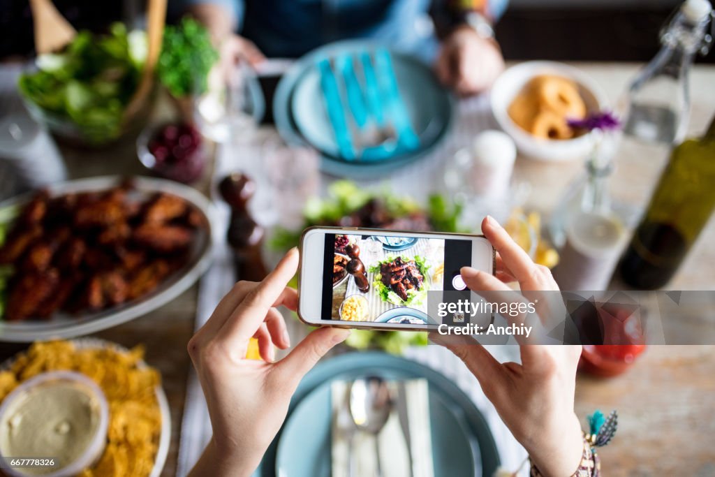 Hipster taking photo for social media before eating it