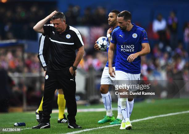 Craig Shakespeare, Manager of Leicester City scratches his head after talking with Danny Drinkwater during the UEFA Champions League Quarter Final...
