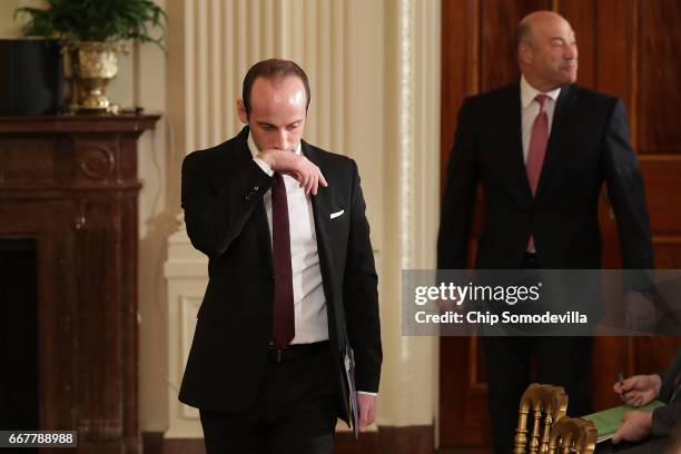 Senior Advisor to the President for Policy Stephen Miller and Director of the National Economic Council Gary Cohn arrive for a news conference with...