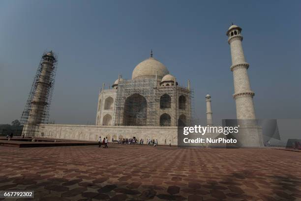 Images around and in the world heritage site and one of the most popular globally tourist attractions, Taj Mahal. Photos are from early morning to...