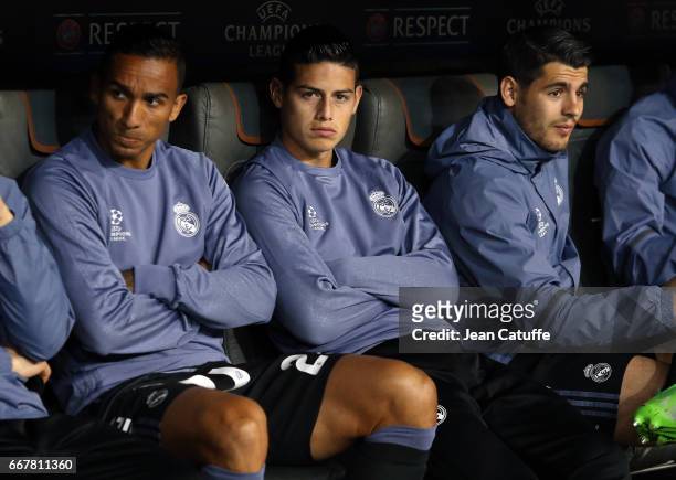 Danilo Luiz da Silva, James Rodriguez, Alvaro Morata of Real Madrid seat on the bench during the UEFA Champions League Quarter Final first leg match...