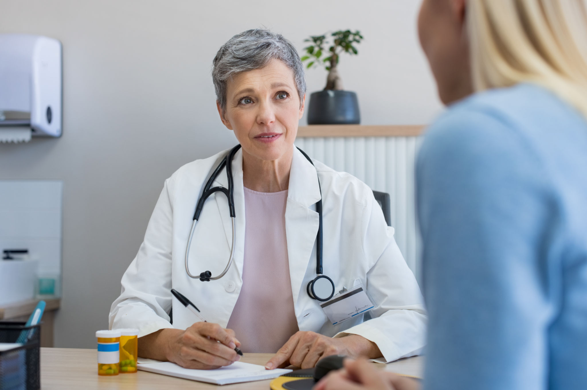 Doctor in a consultation Doctor in a consultation