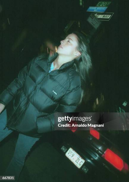 Designer Shoshanna Lonstein quickly walks away from photographers and actor Ben Affleck October 28, 2000 after exiting "Lucky Numbers" at the Loew's...