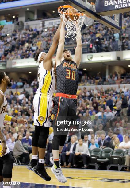 Ryan Kelly of the Atlanta Hawks shoots the ball against the Indiana Pacers at Bankers Life Fieldhouse on April 12, 2017 in Indianapolis, Indiana....