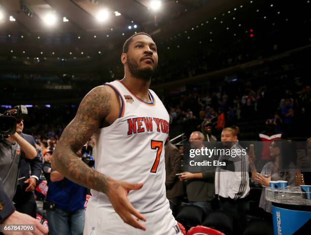 Carmelo Anthony of the New York Knicks walks off the court after the 114-113 win over the Philadelphia 76ers at Madison Square Garden on April 12,...