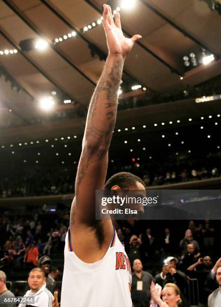 Carmelo Anthony of the New York Knicks waves to the fans as he walks off the court after the 114-113 win over the Philadelphia 76ers at Madison...