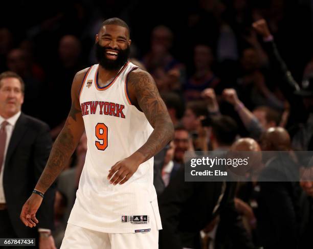 Kyle O'Quinn of the New York Knicks celebrates the 114-113 win over the Philadelphia 76ers at Madison Square Garden on April 12, 2017 in New York...