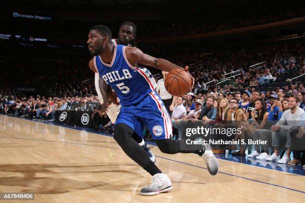 Alex Poythress of the Philadelphia 76ers handles the ball against the New York Knicks on April 12, 2017 at Madison Square Garden in New York City,...