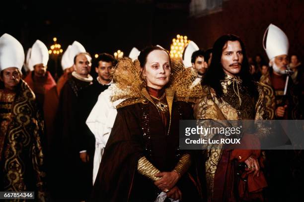 Italian actress Virna Lisi and French actor Pascal Greggory on the set of the 1994 film La Reine Margot , directed by Patrice Chereau.