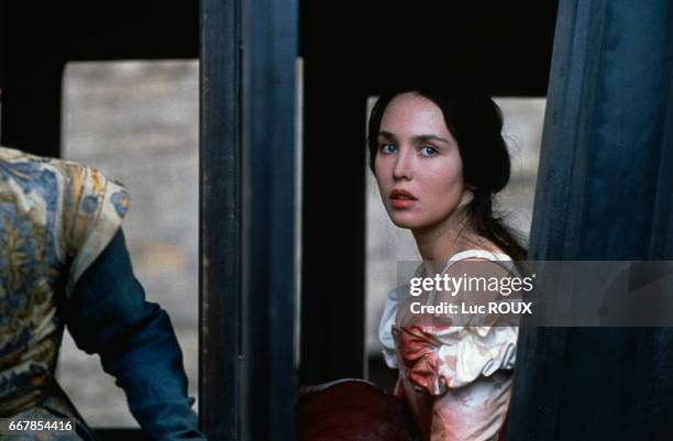 French actress Isabelle Adjani on the set of the 1994 film La Reine Margot , directed by Patrice Chereau.
