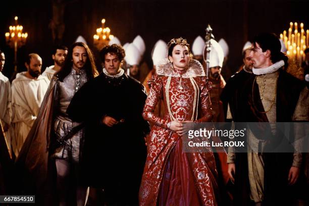 French actors Jean-Hugues Anglade and Daniel Auteuil with French actress Isabelle Adjani on the set of the 1994 film La Reine Margot , directed by...
