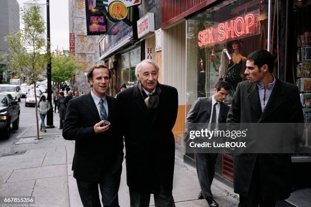 French actors Charles Berling, Philippe Noiret, Bruno Putzulu, and Pascal Elbe on the set of the film Pere et Fils, directed by Michel Boujenah.