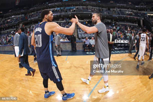 Hammons of the Dallas Mavericks and Marc Gasol of the Memphis Grizzlies shake hands after the game on April 12, 2017 at FedEx Forum in Memphis,...