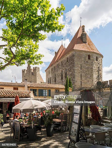 outdoor restaurant in medieval town - carcassonne stock pictures, royalty-free photos & images