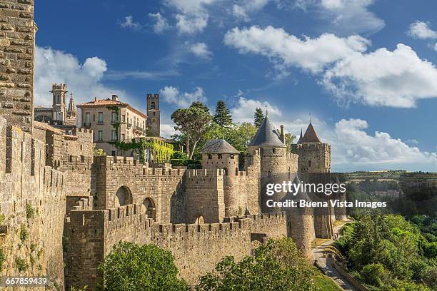 the fortified city of carcassonne - burg stock-fotos und bilder