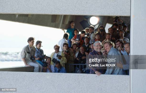 French director Maurice Pialat, actress Sandrine Bonnaire, and actor Gerard Depardieu attend the 40th Cannes Film Festival for the presentation of...