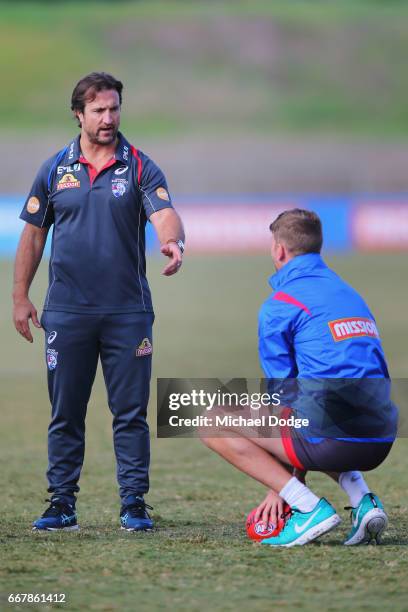 Bulldogs head coach Luke Beveridge appears to speak strongly to Jake Stringer of the Bulldogs during a Western Bulldogs AFL training session at...