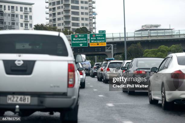 People leave the city early congesting roads before Cyclone Cook is due to reach landfall on April 14, 2017 in Auckland, New Zealand. Reports suggest...