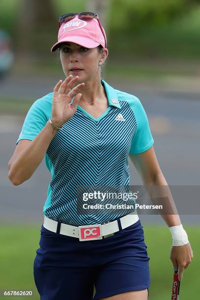 Paula Creamer reacts to a putt on the eighth green during the first round of the LPGA LOTTE Championship Presented By Hershey at Ko Olina Golf Club...