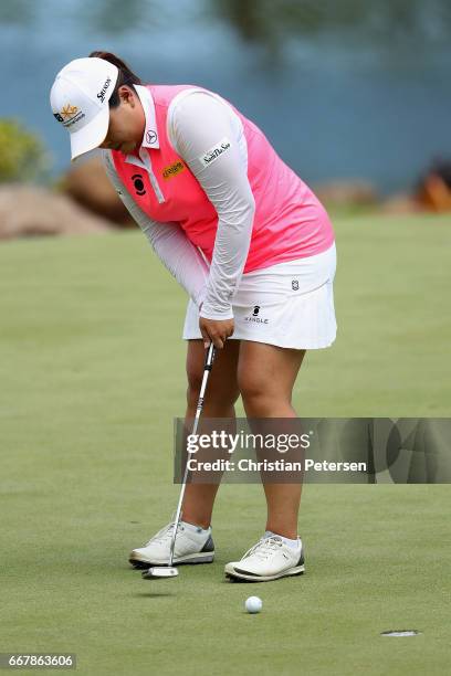 Inbee Park of Republic of Korea putts on the eighth green during the first round of the LPGA LOTTE Championship Presented By Hershey at Ko Olina Golf...