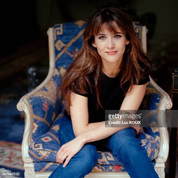 French actress and director Sophie Marceau in London, clothes by Dries Van Noten, shoes by Dior.