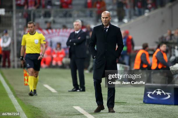 Coach of Real Madrid Zinedine Zidane, coach of Bayern Munich Carlo Ancelotti during the UEFA Champions League Quarter Final first leg match between...