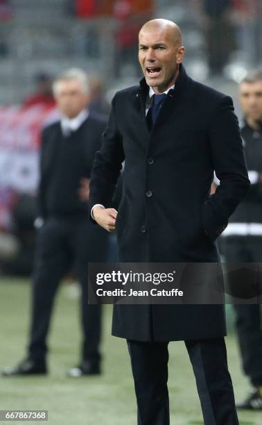 Coach of Real Madrid Zinedine Zidane, coach of Bayern Munich Carlo Ancelotti during the UEFA Champions League Quarter Final first leg match between...