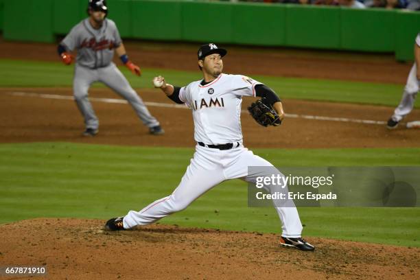 Junichi Tazawa of the Miami Marlins pitches during the 8th inning against the Atlanta Braves at Marlins Park on April 12, 2017 in Miami, Florida.