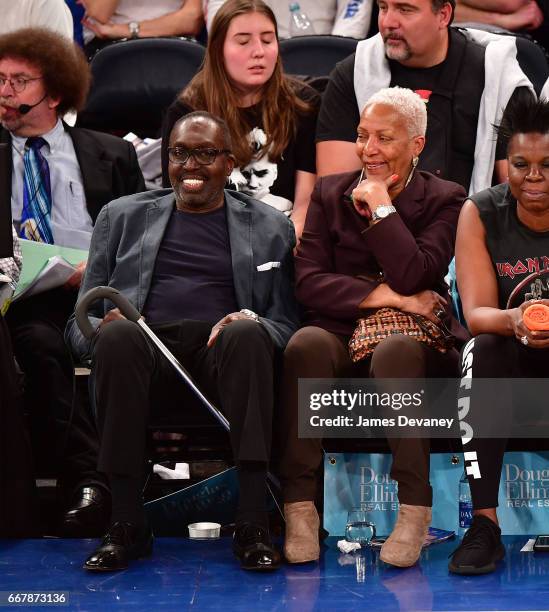 Earl Monroe and Marita Green attend Philadelphia 76ers Vs. New York Knicks game at Madison Square Garden on April 12, 2017 in New York City.