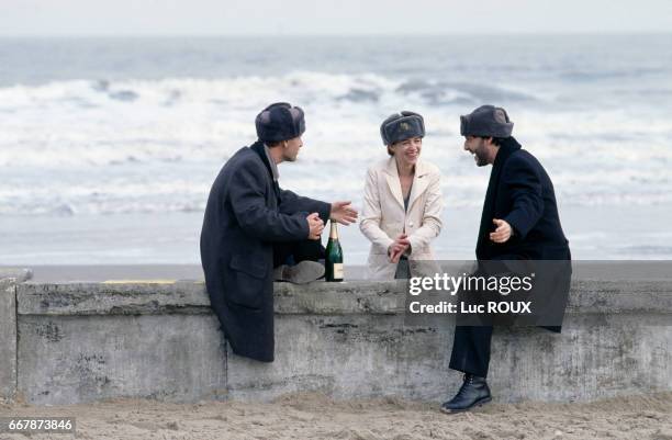 French actors Charles Berling, Charlotte Gainsbourg, and Yvan Attal on the set of the film Love, etc., directed by Marion Vernoux.
