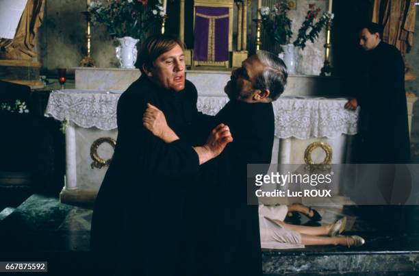 French actor Gerard Depardieu and actor and director Maurice Pialat on the set of Pialat's film Sous le Soleil de Satan . The film won the Palme d'Or...