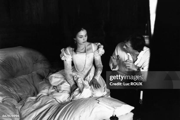 French actress Isabelle Adjani and director Patrice Chereau on the set of Chereau's 1994 film La Reine Margot .