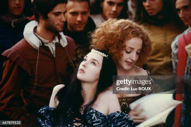 French actresses Isabelle Adjani and Dominique Blanc on the set of the 1994 film La Reine Margot , directed by Patrice Chereau.