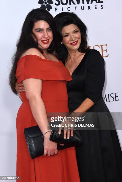 Shohreh Aghdashloo and daughter Tara Touzie attend the premiere of 'The Promise' at the Chinese theatre in Hollywood, on April 12, 2017. / AFP PHOTO...