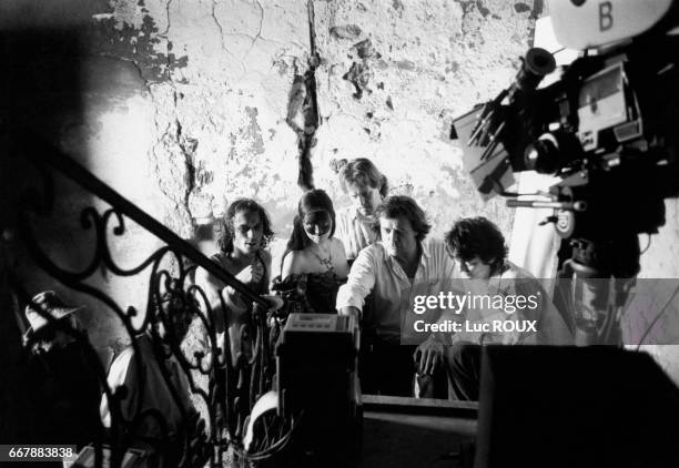 Swiss actor Vincent Perez, French actress Isabelle Adjani, and French director Patrice Chereau on the set of La Reine Margot .