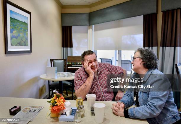 Julie Torrence visits her father Clyde Hill, left, for lunch at Twin Oaks Health and Rehab on March 27, 2017 in Lansing, Kan. About half of those who...