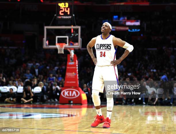 Paul Pierce of the LA Clippers smiles on the court as he appears in his final regular season game during the final minutes of the fourth quarter...