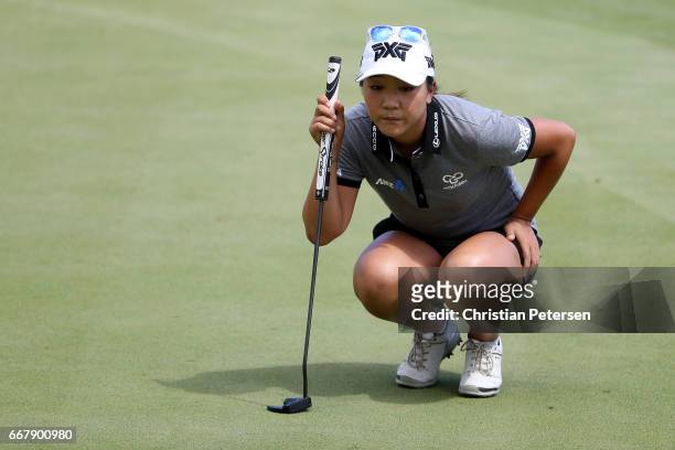 Lydia Ko of New Zealand putts on the seventh green during the first round of the LPGA LOTTE Championship Presented By Hershey at Ko Olina Golf Club...