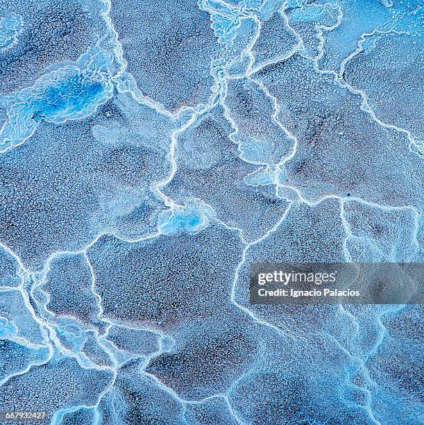 salt textures, tatio geysers, atacama desert - geysir stock-fotos und bilder