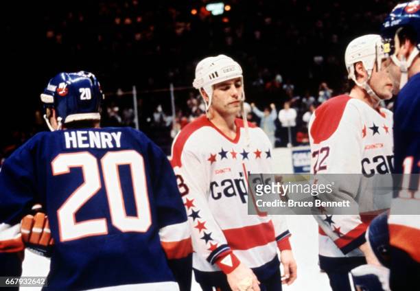 Scott Stevens of the Washington Capitals shows disappointment during the hand shake line after losing in 4 overtimes to the New York Islanders in...