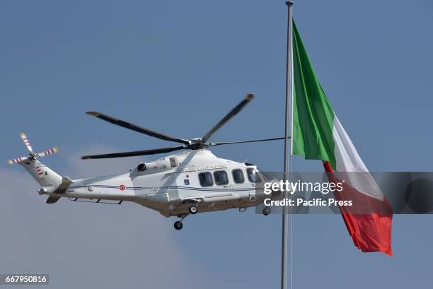 The arrival by helicopter of the Italian Defense Minister Roberta Pinotti during the oath ceremony.